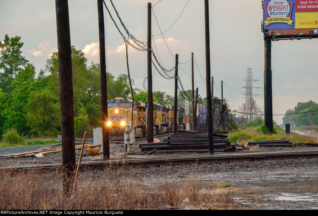 UP AC45CCTE locomotive leading a train in the Yard